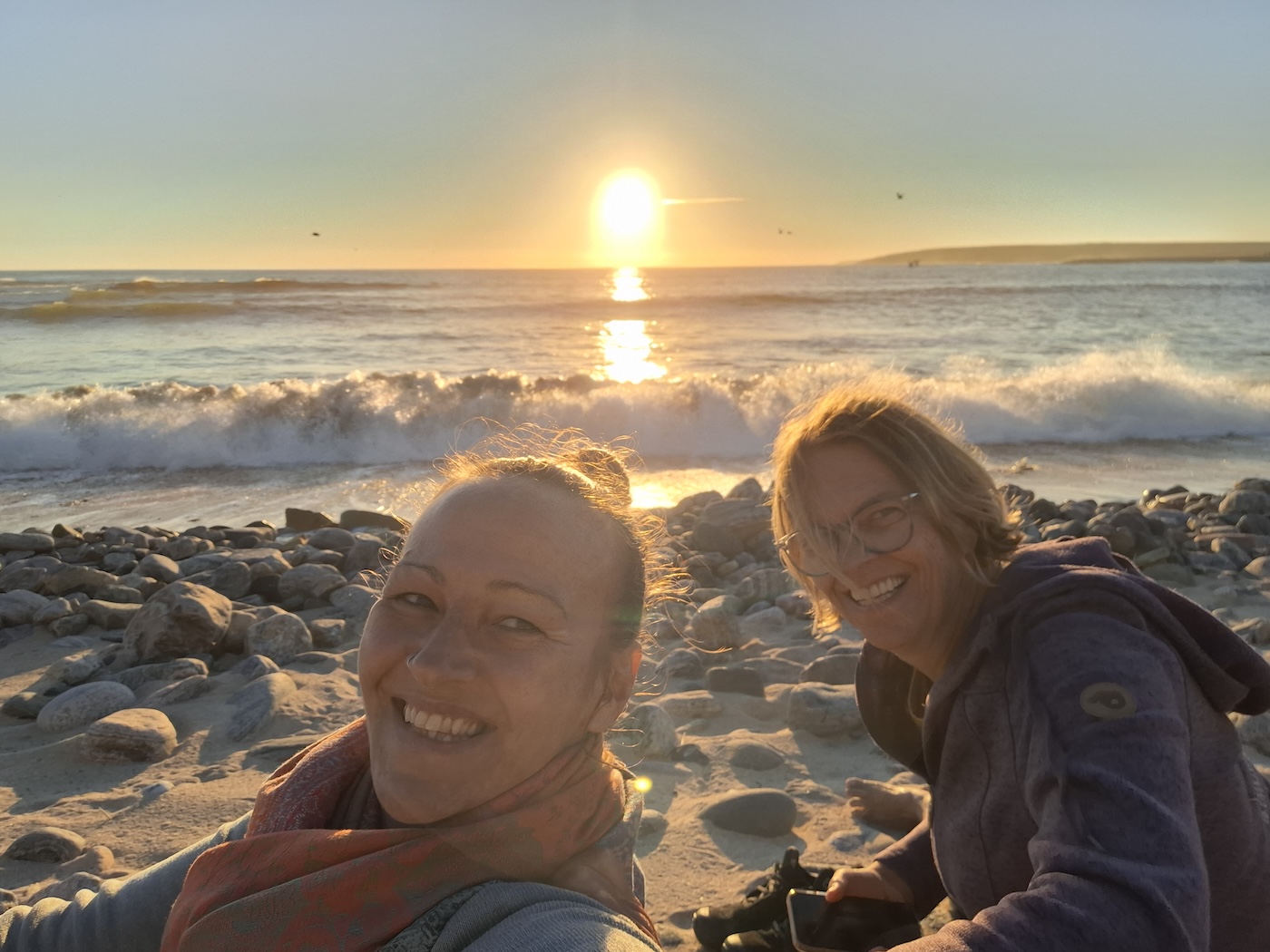 Ursula Bencsics and Katharina Buttenhauser smiling together during a professional coaching session
